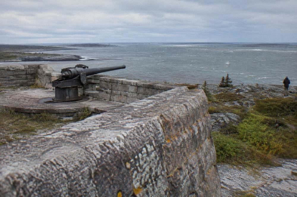 A stone historic battery site overlooking a wide northern river estuary